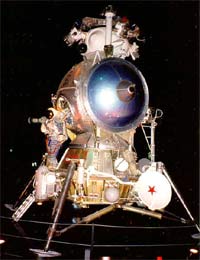 Cosmonaut exits lunar lander mock up